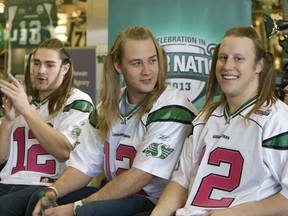 Graig Newman (left), Scott McHenry and Sam Hurl look a lot different in training camp with the Riders than they did in this file photo from last year's fundraiser for Cameco Touchdown for Dreams (GREG PENDER/STAR PHOENIX)
