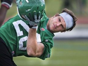Craig Butler stretching it out during training camp (Gord Waldner/ The StarPhoenix)