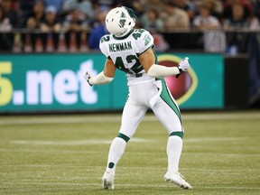 Graig Newman celebrated his first CFL sack on Thursday (Tom Szczerbowski/Getty Images)