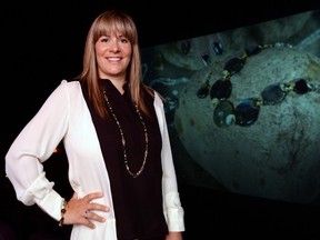 Hillberg & Berk’s founder Rachel Mielke poses in front of the giant IMAX screen used to launch H&B's Aurora Lux luxury jewelry collection Thursday night . DON HEALY/Leader-Post