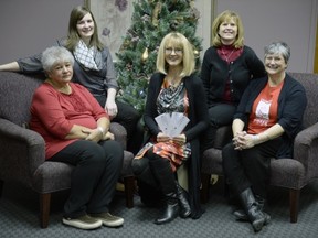 Initial payments were presented before Christmas to representatives of the four shelters supported by the Leader-Post Christmas Cheer Fund. Left to right: Margaret Crowe of WISH Safe House, Amy Stensrud of the YWCA Regina's Isabel Johnson Shelter, Irene Seiberling of the Leader-Post Christmas Cheer Fund, Sarah Valli of SOFIA House and Maria Hendrika of Regina Transition House. PBRYAN SCHLOSSER/Leader-Post.