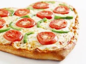 Pizza Pizza is offering a heart-shaped Veggie Delight pizza for Valentine's Day. PIZZA PIZZA photo