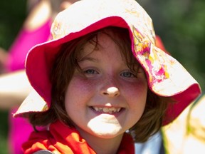 Remember to wear a hat and apply sunscreen to protect yourself from the sun while camping. SCOUTS CANADA photo