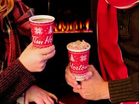 Tim Hortons holiday cups  feature a celebratory hashtag – #WarmWishes. TIM HORTONS photo