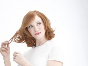 Christina Hendricks, the new brand ambassador for nice 'n easy, is pictured wearing her nice’n easy shade: Permanent Colour Crème Natural Light Auburn (6R)
during the brand’s recent advertising shoot.