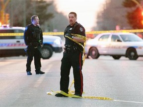 Regina police at the scene of a shooting at the corner of 4th Avenue and Athol Street in Regina on April 25, 2014. (Don Healy/ Leader-Post)