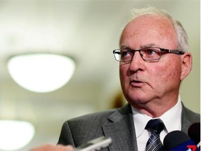 Agriculture Minister Lyle Stewart speaks at the Legislative Building in Regina in May.  Stewart was responding to WTO ruling that the U.S. Country of Origin Labelling law is an illegal trade barrier under international trade rules. TROY FLEECE / Regina Leader-Post