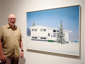 Artist David Thauberger standing by works from his Road Trips exhibition, which will be on display at the gallery until Aug. 30
