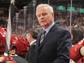 Assistant Coach Dave King of the Phoenix Coyotes talks to some of his players on the bench during a game against the Colorado Avalanche on March 27, 2010 at Jobing.com Arena in Glendale, Arizona.