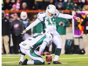 CALGARY, AB - OCTOBER 24: Chris Milo #19 of the Saskatchewan Roughriders kicks the ball for a field goal against the Calgary Stampeders during a CFL game at McMahon Stadium on October 24, 2014 in Calgary, Alberta, Canada. (Photo by Derek Leung/Getty Images)