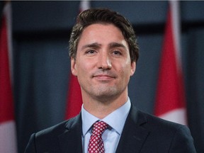 Canadian Liberal Party leader Justin Trudeau speaks at a press conference in Ottawa on October 20, 2015 after winning the general elections.