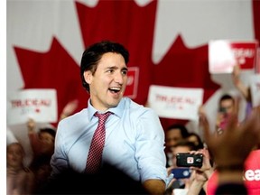 Canadian Liberal Party leader Justin Trudeau arrives at a victory rally in Ottawa on October 20, 2015. Canada is “back” on the world stage, newly-elected prime minister Justin Trudeau said Tuesday after a landslide victory that ended nearly a decade of conservative rule. “I want to say to this country’s friends all around the world, many of you have worried that Canada has lost its compassionate and constructive voice in the world over the past 10 years,” Trudeau told a rally. “On behalf of 35 million Canadians, we’re back”.
