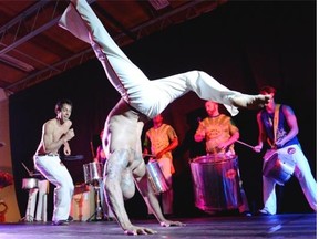 Capoeira is performed by Viva Brazil at the Brazilian pavilion Saturday during Mosaic.