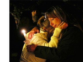 BLAIRMORE, AB -- Family and friends of missing two-year-old Hailey Dunbar-Blanchette reacted at a candlelight vigil after being told the amber alert had been officially cancelled after human remains had been found on September 15, 2015. A member of the RCMP Victim Services unit was the person to inform the crowd.
