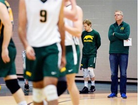 Cougars head coach Greg Barthel, left, during a game against the MacEwan University Griffins at the University of Regina, Sask. on Saturday Oct. 3, 2015.