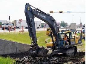 Crews start work as traffic continues along Victoria Avenue near Coleman Cr. Monday afternoon.  There will be traffic tie-ups in the area until construction on the major roadway is completed in October.