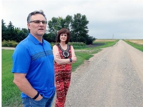 Dana and Craig Martin on their farm. They are two of the many residents being affected by the bypass construction.