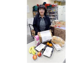 Dana Folkersen of REACH with samples of the convenience meals suitable for seniors, farmers during harvest or back-to-school.