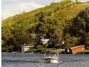 Derek and Bart Leach bring their boat to shore in Echo Valley Provincial Park, Sask. on Monday Sept. 1, 2014. (Michael Bell/Regina Leader-Post Files)