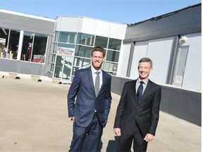 Drew (L) and Graeme Hunter (R) in front of a commercial building they are redeveloping into multi-tenant, office-commercial building in the warehouse district in Regina.