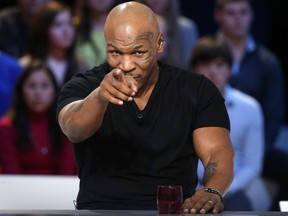 US Former heavyweight boxing champion Mike Tyson attends the TV show "Le Grand Journal" on the French television channel Canal Plus on December 9, 2013 in Paris.