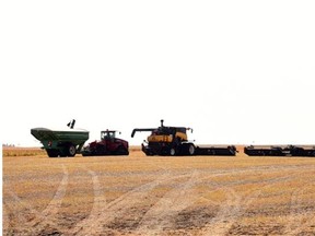 Harvesting equipment sits idle in a field south of Regina. Harvest operations are well ahead of average for this time of year, according to the weekly crop report. (DON HEALY/Regina Leader-Post) (Story by Bruce Johnstone) (BUSINESS)