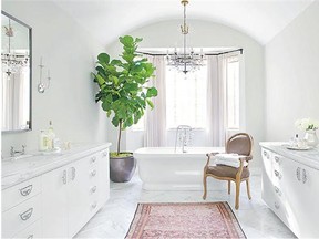 A master bathroom in a residence in Beverly Hills, Calif., is adorned with Asian Inspired door pulls, a favourite design choice of interior designer Betsy Burnham.