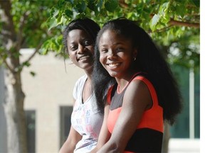 International students Marion Idun (left) of Ghana and Chiamaka Okorie (right) of Nigeria pose at the University of Regina on Saturday June 13, 2015.