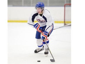 Jake Leschyshyn brings the puck out of his zone during the Regina Pats Rookie Camp held at the Co-operators Centre in Regina, Sask. on Saturday Aug. 29, 2015. (Michael Bell/Regina Leader-Post)