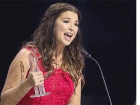 Jess Moslaluke wins the female artist of the year award at the Canadian Country Music Association Awards in Halifax on Sunday, Sept. 13, 2015.