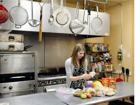 Katrina Robinson, director of development at Souls Harbour Mission, puts together items they need to make the upcoming Thanksgiving Day supper in Regina on Thursday.