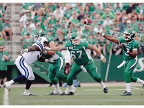 Kevin Glenn, right, and the Roughriders' offence put up some big numbers against Toronto on Sunday, but some miscues proved to be costly. 
  
 Michael Bell/Leader-Post
