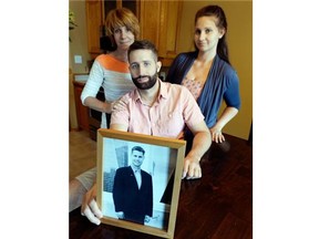Kyle, Hillary (right) and wife Tami Moffat with a photo of the late Wade Moffatt, a former CTV exec who took his life recently after battle bipolar disorder.