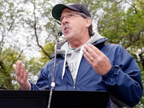 Larry Hubich, Saskatchewan Federation of Labour president, speaks during a Labour Day picnic held near the Legislative Building in Regina, Sask. on Monday Sep. 7, 2015. (Michael Bell/Regina Leader-Post)