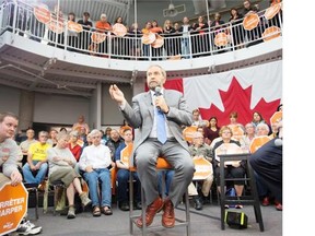 NDP Leader Tom Mulcair speaks to supporters at a town hall meeting Tuesday, October 6, 2015 in Surrey, B.C.