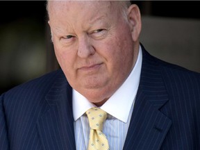 Former Conservative Senator Mike Duffy leaves the courthouse in Ottawa, following the sixth day of testimony by Nigel Wright, former Chief of Staff to Prime Minister Stephen Harper, on Wednesday, Aug. 19, 2015. Duffy is facing 31 charges of fraud, breach of trust, bribery, frauds on the government related to inappropriate Senate expenses.