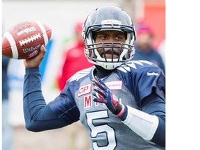 Montreal Alouettes quarterback Kevin Glenn throws a pass during first half CFL football action against the Hamilton Tiger Cats in Montreal, Sunday, October 18, 2015. THE CANADIAN PRESS/Graham Hughes