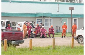 Firefighters on break in forest fire fighting at Montreal Lake on Thursday, July 9th, 2015.