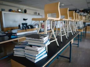 In a bid to address its debt, Saskatchewan's French school division is transferring control of its Lloydminster school to Alberta and using up to $1.3 million in surplus funds to pay off its $7.6-million line of credit.