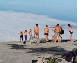 This photo posted to the the Kinabalu Park Facebook page reportedly shows the 10 tourists who posed naked at Mount Kinabalu.
