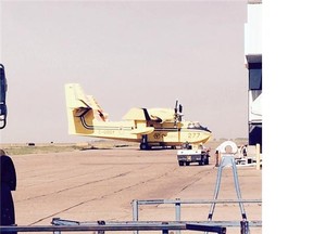 One of two Ontario Ministry of Natural Resources CL-415 air tankers that passed through Regina Wednesday on their way to fight fires. (Will Chabun/Leader-Post)