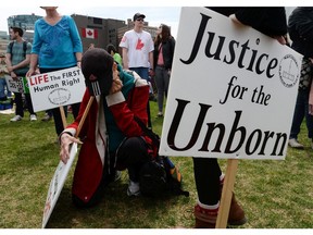 People take part in the "March For Life" on Parliament Hill in Ottawa on Thursday, May 8, 2014.