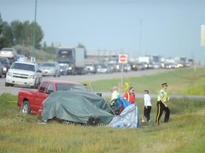 Two people were killed in a motor vehicle collision at the corner of Highway #1 and Highway #624 at the Pilot Butte turnoff on Wednesday.