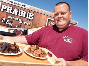 Pitmaster Rob Reinhardt from Prairie Smoke & Spice BBQ with beef brisket (left) and pulled pork in Regina, June 9, 2015. Reinhardt is one of the organizers of the Pile O Bones BBQ Championships, the largest professional barbecue competition in Saskatchewan’s history. (DON HEALY/Regina, Leader-Post)