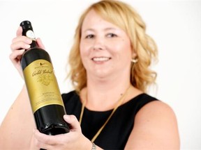 Raquel Moleski displays some products being sampled at this year’s Wine & Spirits Gala.