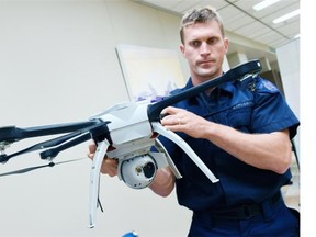 RCMP Cpl. Eldon Hoffman with a tactical UAV at the University of Regina during a two-day workshop on using UAVs for public safety and emergency services.