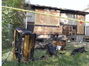 REGINA, SK: AUGUST 01, 2015 --  An early Tuesday morning fire took place at a bungalow located on 864 Rae Street in Regina on August 04, 2015.  The bungalow, located between 2nd and 3rd Avenue in the city´s North Central neighbourhood, caught fire a little before 1:30 a.m. in the morning.  Regina Firefighters have not yet released any information about the cause.  DON HEALY/Regina, Leader-Post) (Story by David Fraser) (NEWS)