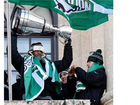 Regina-born defensive back Paul Woldu, shown hoisting the Grey Cup in 2013, was among the final cuts announced by the Saskatchewan Roughriders on Saturday. 
  
 Bryan Schlosser/Leader-Post files