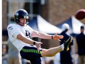 Regina-born Seattle Seahawks punter Jon Ryan, shown Thursday at training camp, has attracted plenty of attention after appearing on American Ninja Warrior.