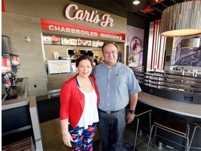 Robyn and Ernie Kouros, co-owners of the newly opened Carl’s Jr. in Regina, on Wednesday.
